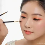 웨딩 메이크업 전문가 업무 사례 - **"A close-up portrait of a beautiful Japanese bride receiving her 'personal color' makeup. The prof...